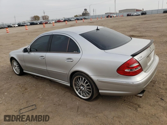 2005 Mercedes-Benz E-Class 5.5L AMG with VIN WDBUF76J05A730404, listed as a Copart auction lot 78168554 with 154,164 mi miles and Clean Title. Bid and sale history available at carsss.com. Image 2.
