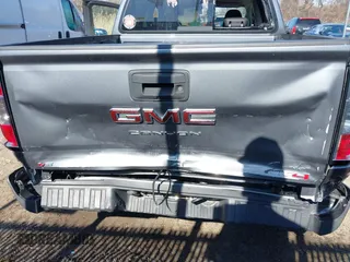 2021 GMC Canyon 4WD AT4 w/Leather with VIN 1GTG6FENXM1282684, listed as a IAAI auction lot 41757981 with 44,807 mi miles. Bid and sale history available at carsss.com. Image 6.