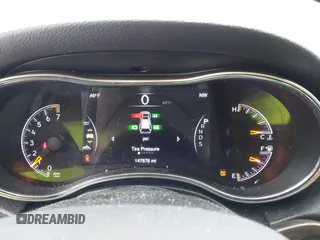 2014 Jeep Grand Cherokee Limited with VIN 1C4RJFBG7EC497622, listed as a IAAI auction lot 41667930 with 147,876 mi miles and . Bid and sale history available at DreamBid. Image 7.