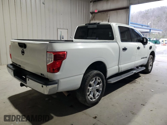 2016 Nissan Titan Platinum Reserve z VIN 1N6BA1F27GN502647, wystawiony jako Copart lot #53079895 z przebiegiem 143 384 mil mil oraz Czysty tytuł • Clean title. Historia ofert i sprzedaży dostępna na DreamBid. Obrazek 3.
