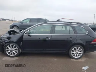2012 Volkswagen Jetta TDI w/Sunroof & Nav z VIN 3VWPL7AJ7CM640498, wystawiony jako IAAI lot #40860464 z przebiegiem 128 505 mil mil oraz . Historia ofert i sprzedaży dostępna na DreamBid. Obrazek 14.