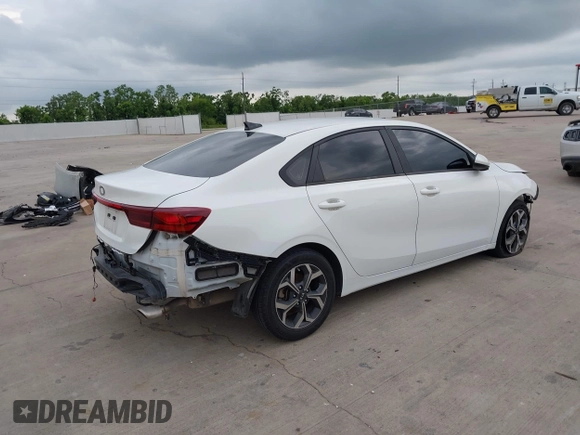 2021 Kia Forte LXS with VIN 3KPF24AD0ME361786, listed as a IAAI auction lot 42427196 with 60,013 mi miles and . Bid and sale history available at DreamBid. Image 4.