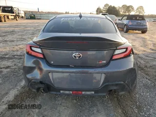 2024 Toyota GR86 Premium with VIN JF1ZNBE17R9751729, listed as a Copart auction lot 86863454 with 11,909 mi miles and Salvage Title. Bid and sale history available at carsss.com. Image 6.