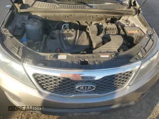 2012 Kia Sorento LX with VIN 5XYKTCA62CG255185, listed as a Copart auction lot 87242304 with 124,224 mi miles and Salvage Title. Bid and sale history available at DreamBid. Image 12.