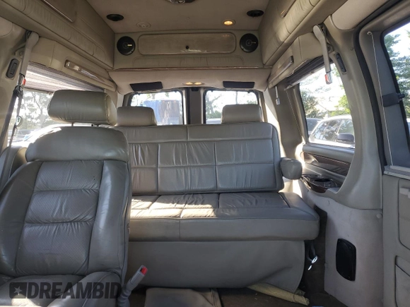2004 Chevrolet Express Passenger z VIN 1GBFG15T841212230, wystawiony jako Copart lot #61109634 z przebiegiem 154 493 mil mil oraz Szkoda całkowita • Salvage title. Historia ofert i sprzedaży dostępna na DreamBid. Obrazek 10.