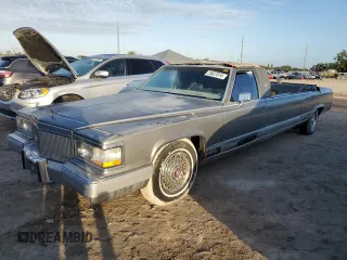 1990 Cadillac Brougham z VIN 1G6DW5472LR711206, wystawiony jako Copart lot #75627814 z przebiegiem Nie podano mil oraz Nie do naprawy. Historia ofert i sprzedaży dostępna na DreamBid. Obrazek 1.