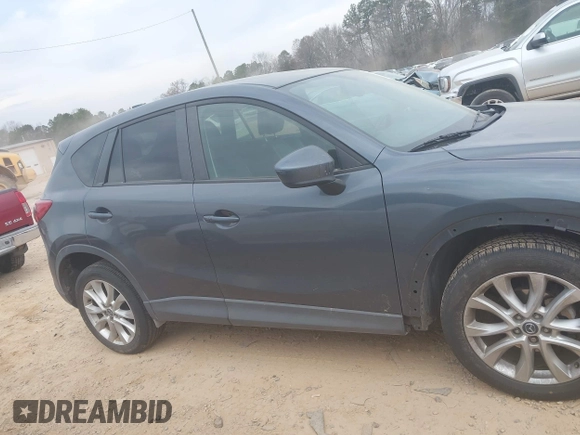 2013 Mazda CX-5 Grand Touring with VIN JM3KE4DE2D0164225, listed as a IAAI auction lot 41663412 with 162,738 mi miles. Bid and sale history available at carsss.com. Image 13.