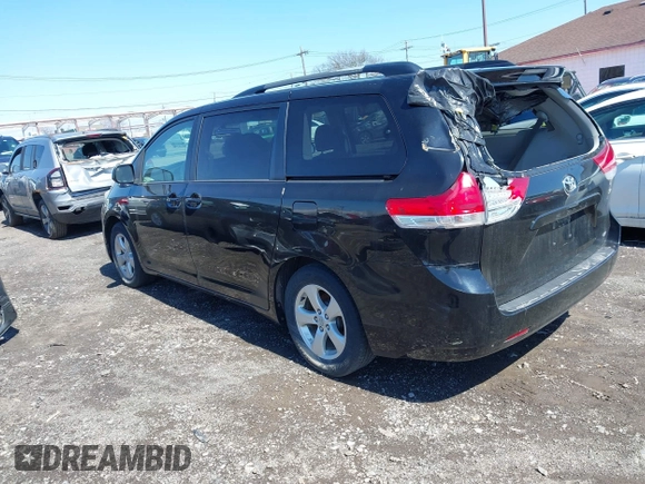 2014 Toyota Sienna LE AAS with VIN 5TDKK3DC4ES445998, listed as a IAAI auction lot 42093872 with 220,943 mi miles. Bid and sale history available at carsss.com. Image 3.