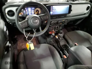 2024 Jeep Wrangler Willys with VIN 1C4PJXDG5RW312580, listed as a Copart auction lot 49144005 with 5,713 mi miles and Salvage Title. Bid and sale history available at carsss.com. Image 8.