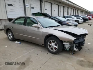 2002 Oldsmobile Aurora z VIN 1G3GR64H224169066, wystawiony jako Copart lot #44636565 z przebiegiem 69 419 mil mil oraz Szkody całkowita. Historia ofert i sprzedaży dostępna na DreamBid. Obrazek 4.
