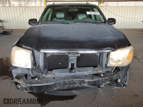 2006 GMC Envoy Denali with VIN 1GKES63M662302685, listed as a Copart auction lot 74315054 with 80,134 mi miles and Salvage Title. Bid and sale history available at carsss.com. Image 5.