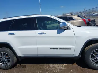 2018 Jeep Grand Cherokee Limited with VIN 1C4RJFBG5JC195143, listed as a IAAI auction lot 41993171 with 118,036 mi miles and . Bid and sale history available at DreamBid. Image 13.