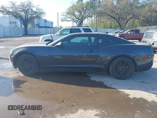 2011 Chevrolet Camaro 1LT z VIN 2G1FB1ED6B9166854, wystawiony jako IAAI lot #41694968 z przebiegiem 203 119 mil mil oraz . Historia ofert i sprzedaży dostępna na DreamBid. Obrazek 14.