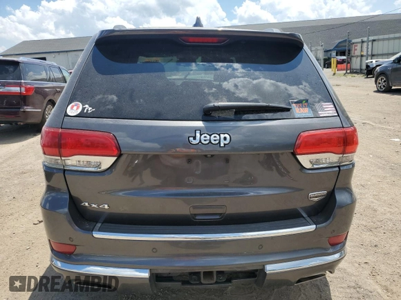 2014 Jeep Grand Cherokee Summit with VIN 1C4RJFJT2EC145918, listed as a Copart auction lot 62718985 with 164,145 mi miles and Clean title. Bid and sale history available at DreamBid. Image 6.