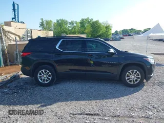 2019 Chevrolet Traverse LT Cloth z VIN 1GNERGKW3KJ292477, wystawiony jako IAAI lot #42123155 z przebiegiem 102 233 mil mil oraz . Historia ofert i sprzedaży dostępna na DreamBid. Obrazek 13.