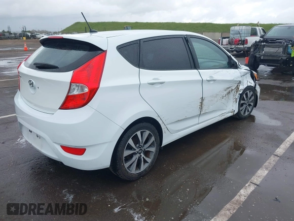 2016 Hyundai Accent Sport with VIN KMHCU5AE4GU249974, listed as a IAAI auction lot 41916351 with 127,692 mi miles. Bid and sale history available at carsss.com. Image 4.