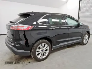 2021 Ford Edge Titanium с VIN 2FMPK4K94MBA27083, выставлен на аукционе Copart как лот 62149285 с пробегом 128 325 миль миль и Чистый • Clean title. История ставок и продаж доступна на DreamBid. Изображение 3.