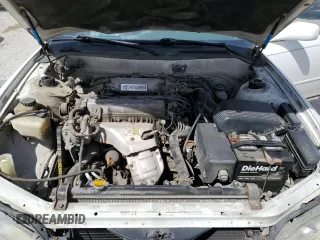 1994 Toyota Camry LE z VIN JT2SK12E0R0256694, wystawiony jako Copart lot #52819245 z przebiegiem 182 566 mil mil oraz Szkoda całkowita • Salvage title. Historia ofert i sprzedaży dostępna na DreamBid. Obrazek 12.