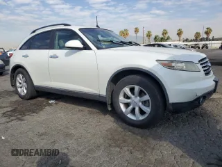 2005 Infiniti FX with VIN JNRAS08W75X218197, listed as a Copart auction lot 70484194 with 153,426 mi miles and Salvage Title. Bid and sale history available at DreamBid. Image 4.