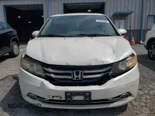 2014 Honda Odyssey Touring with VIN 5FNRL5H94EB080815, listed as a Copart auction lot 65244325 with 153,314 mi miles and Salvage title. Bid and sale history available at DreamBid. Image 5.