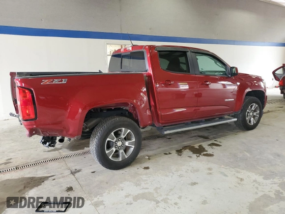 2020 Chevrolet Colorado 4WD Z71 z VIN 1GCGTDENXL1111901, wystawiony jako Copart lot #57093195 z przebiegiem 60 992 mil mil oraz Szkoda całkowita • Salvage title. Historia ofert i sprzedaży dostępna na DreamBid. Obrazek 3.