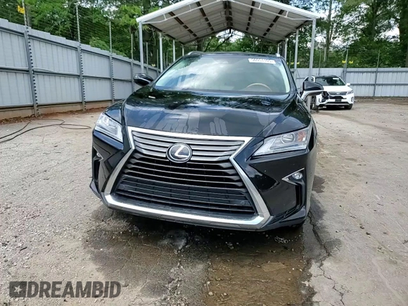 2016 Lexus RX 350 with VIN 2T2ZZMCAXGC012645, listed as a Copart auction lot 56951105 with 149,149 mi miles and Salvage title. Bid and sale history available at DreamBid. Image 14.