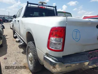 2022 Ram 2500 Tradesman with VIN 3C6UR5HJXNG117791, listed as a IAAI auction lot 42508516 with 61,463 mi miles and . Bid and sale history available at DreamBid. Image 3.