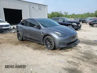 2022 Tesla Model Y Performance with VIN 7SAYGDEF4NF447462, listed as a Copart auction lot 58306595 with 61,671 mi miles and Non repairable. Bid and sale history available at DreamBid. Image 14.