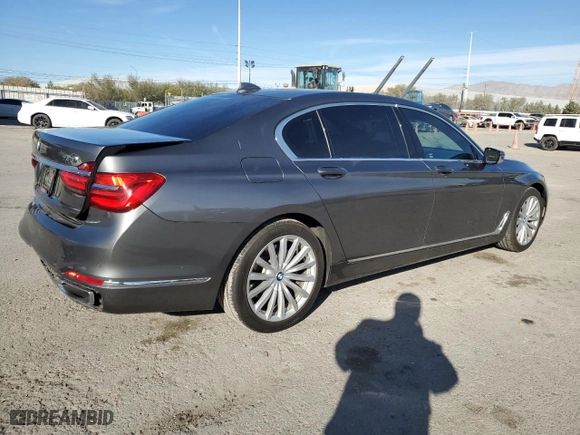 2016 BMW 7 Series 740i with VIN WBA7E2C53GG714464, listed as a Copart auction lot 80776404 with 80,693 mi miles and Salvage Title. Bid and sale history available at carsss.com. Image 3.