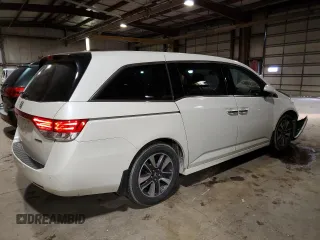 2014 Honda Odyssey Touring with VIN 5FNRL5H90EB137575, listed as a Copart auction lot 54606535 with 168,714 mi miles and Salvage title. Bid and sale history available at DreamBid. Image 3.
