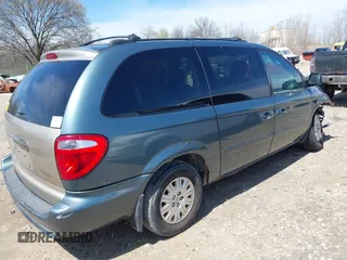 2005 Chrysler Town & Country LX with VIN 2C4GP44R75R267644, listed as a IAAI auction lot 42122611 with 107,802 mi miles and . Bid and sale history available at DreamBid. Image 4.
