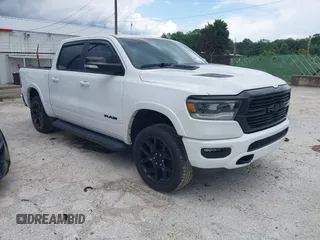 2021 Ram 1500 Laramie z VIN 1C6SRFJT9MN621022, wystawiony jako IAAI lot #42295844 z przebiegiem 38 892 mil mil oraz . Historia ofert i sprzedaży dostępna na DreamBid. Obrazek 1.