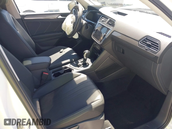 2024 Volkswagen Tiguan SE with VIN 3VVNB7AX2RM022579, listed as a IAAI auction lot 41819850 with 8,651 mi miles and . Bid and sale history available at DreamBid. Image 5.