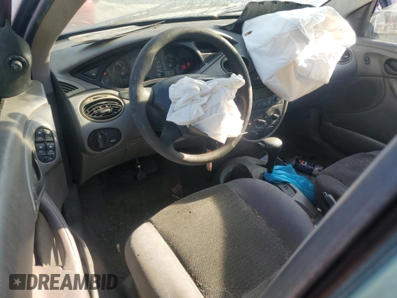 2004 Ford Focus SE with VIN 1FAFP34314W127053, listed as a Copart auction lot 48652265 with 241,841 mi miles and Salvage title. Bid and sale history available at DreamBid. Image 8.