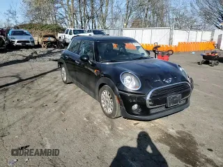 2016 MINI Hardtop 4 Door with VIN WMWXU1C57G2E16741, listed as a Copart auction lot 48392355 with 72,662 mi miles and Salvage Title. Bid and sale history available at DreamBid. Image 11.
