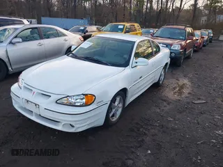1999 Pontiac Grand Am GT with VIN 1G2NW12E3XM830305, listed as a IAAI auction lot 41797278 with 87,537 mi miles. Bid and sale history available at carsss.com. Image 2.