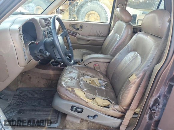1998 Oldsmobile Bravada z VIN 1GHDT13W7W2702905, wystawiony jako Copart lot #77417944 z przebiegiem Nie podano mil oraz Nie do naprawy. Historia ofert i sprzedaży dostępna na DreamBid. Obrazek 7.
