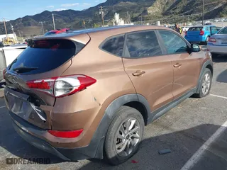 2016 Hyundai Tucson SE with VIN KM8J23A47GU166435, listed as a IAAI auction lot 41952751 with 66,785 mi miles. Bid and sale history available at carsss.com. Image 4.