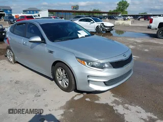 2016 Kia Optima LX with VIN 5XXGT4L31GG078086, listed as a IAAI auction lot 42395087 with 122,686 mi miles and . Bid and sale history available at DreamBid. Image 1.