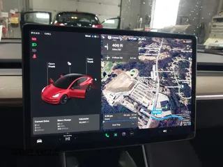 2020 Tesla Model 3 Standard Range Plus z VIN 5YJ3E1EA2LF705670, wystawiony jako IAAI lot #41572352 z przebiegiem 99 980 mil mil oraz . Historia ofert i sprzedaży dostępna na DreamBid. Obrazek 18.