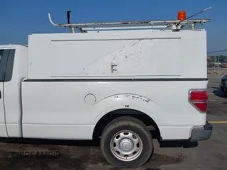 2010 Ford F-150 XL with VIN 1FTMF1CWXAKA46673, listed as a IAAI auction lot 42595017 with 127,715 mi miles and . Bid and sale history available at DreamBid. Image 14.