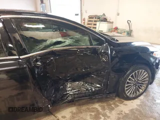2017 Ford Fusion Titanium с VIN 3FA6P0SU8HR215570, выставлен на аукционе IAAI как лот 41427407 с пробегом 97 281 миль миль и . История ставок и продаж доступна на DreamBid. Изображение 6.