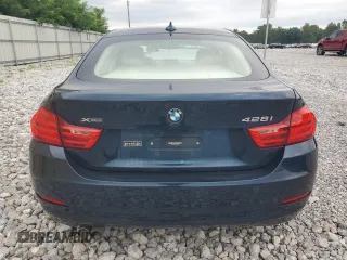 2015 BMW 4 Series 428i xDrive with VIN WBA4C9C57FD330687, listed as a Copart auction lot 67639034 with 114,779 mi miles and Salvage title. Bid and sale history available at DreamBid. Image 6.