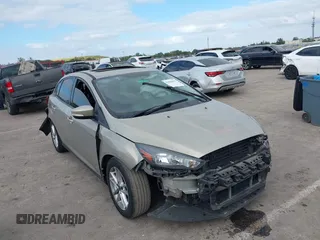 2015 Ford Focus SE with VIN 1FADP3F29FL292655, listed as a IAAI auction lot 41090945 with 106,060 mi miles. Bid and sale history available at carsss.com. Image 14.