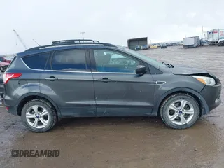 2016 Ford Escape SE with VIN 1FMCU9G93GUB48295, listed as a IAAI auction lot 41808544 with 93,698 mi miles. Bid and sale history available at carsss.com. Image 14.