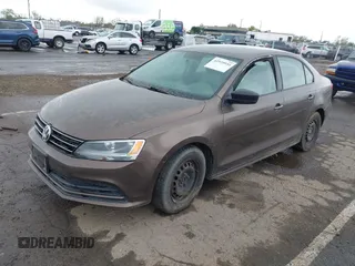 2015 Volkswagen Jetta Sedan 2.0L S with VIN 3VW2K7AJ3FM404626, listed as a IAAI auction lot 41939934 with 136,740 mi miles. Bid and sale history available at carsss.com. Image 2.
