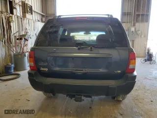 2001 Jeep Grand Cherokee Laredo with VIN 1J4GW48N41C557380, listed as a Copart auction lot 74080604 with 58,005 mi miles and Salvage Title. Bid and sale history available at carsss.com. Image 6.