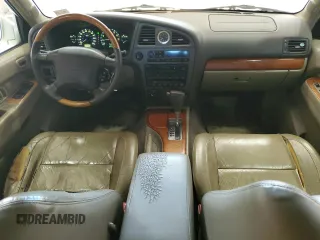 2001 Infiniti QX4 Luxury z VIN JNRDR09Y81W219674, wystawiony jako Copart lot #74221844 z przebiegiem 167 787 mil mil oraz Szkody całkowita. Historia ofert i sprzedaży dostępna na DreamBid. Obrazek 8.