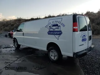 2021 Chevrolet Express Cargo with VIN 1GCWGBFP0M1206747, listed as a Copart auction lot 82701894 with Not provided miles and Salvage title. Bid and sale history available at DreamBid. Image 2.