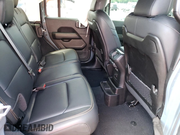 2024 Jeep Wrangler Sahara with VIN 1C4PJXEGXRW269062, listed as a Copart auction lot 64576895 with 2,159 mi miles and Salvage title. Bid and sale history available at DreamBid. Image 11.